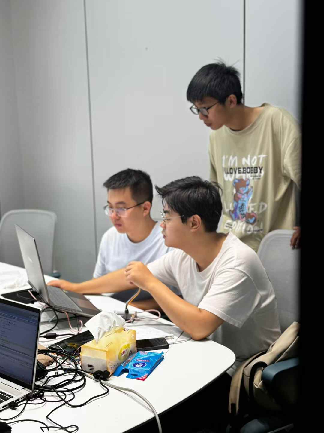 Students attentively learning FPGA theory in a multimedia classroom