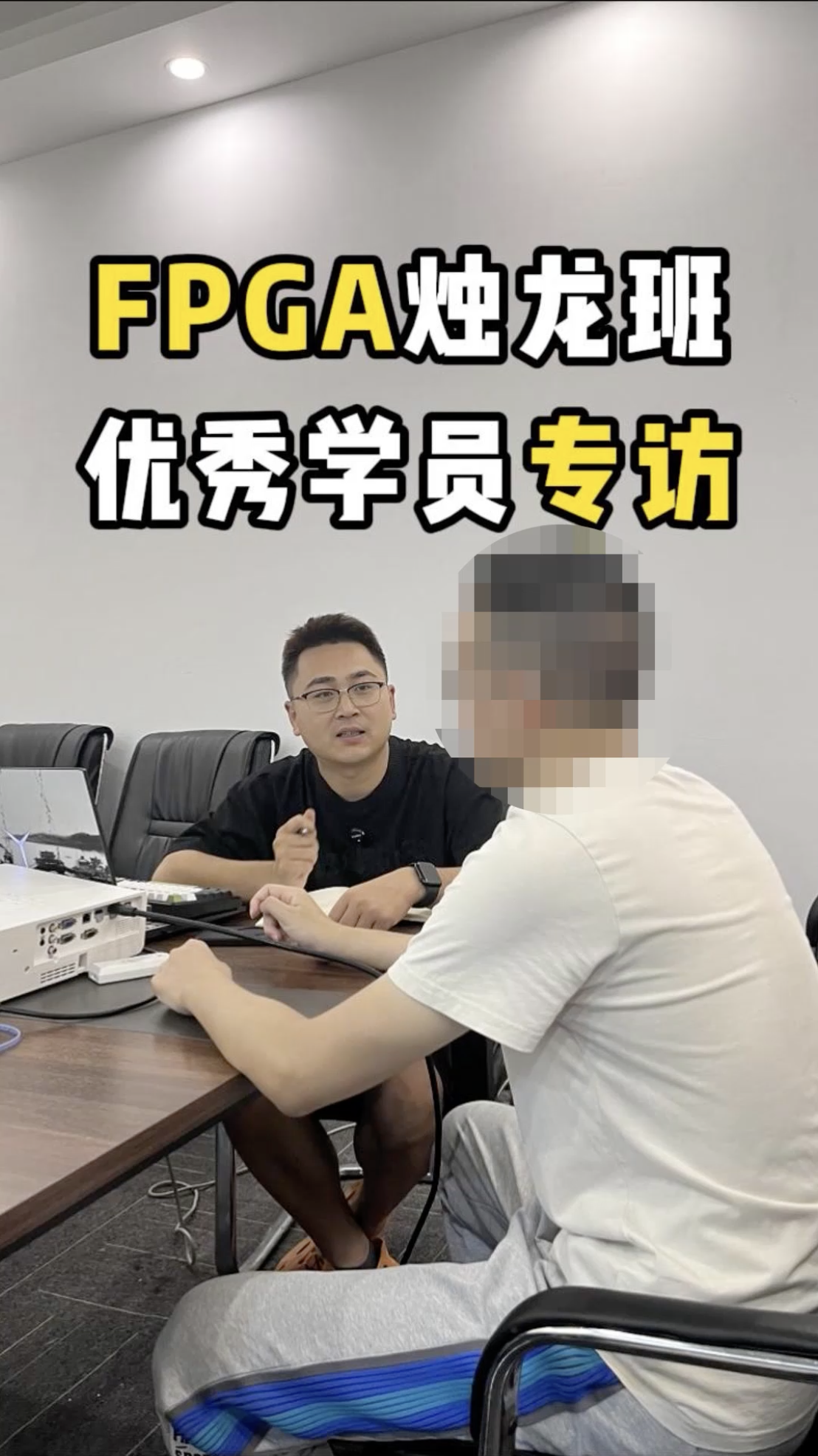 A student working on an FPGA development board in a lab